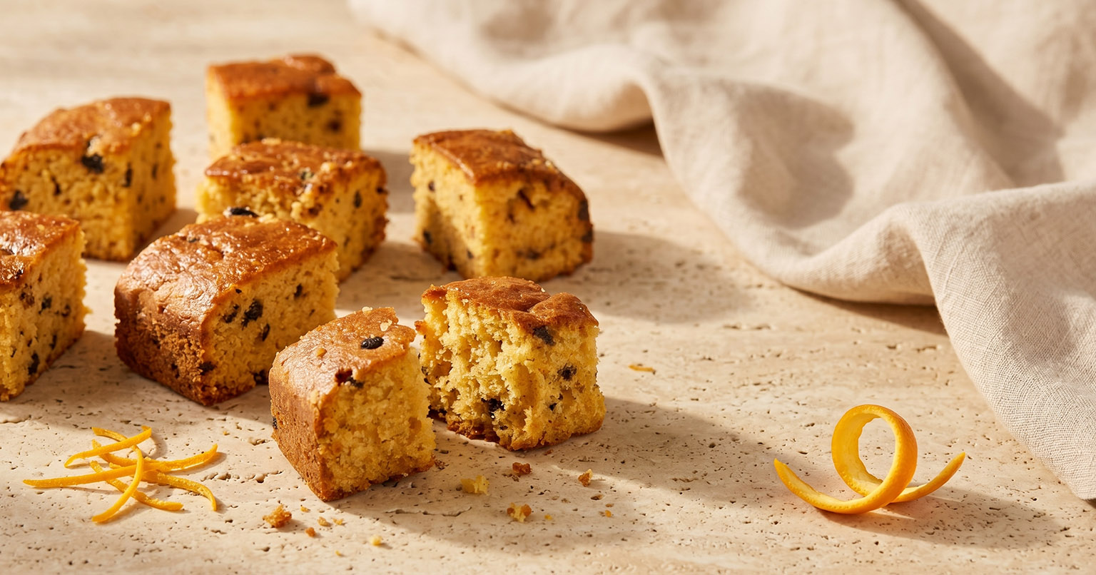 Orange Cake with Chocolate Pieces on the table
