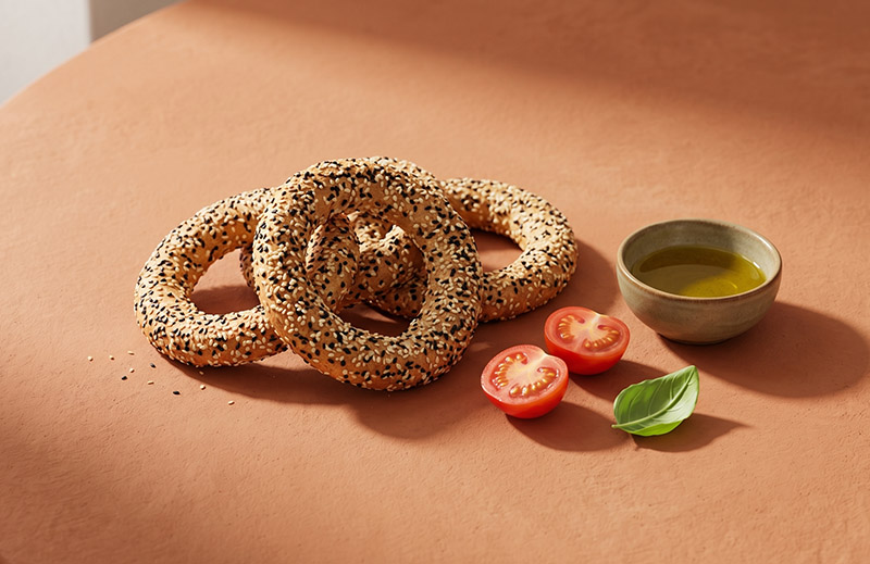 Kourkoulos Tomato Bread Rings served on a table